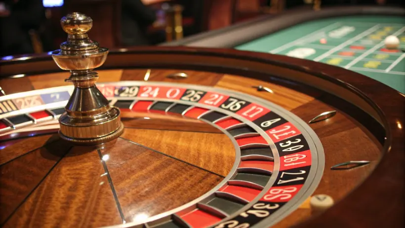 Roulette wheel with ball in motion demonstrating probability