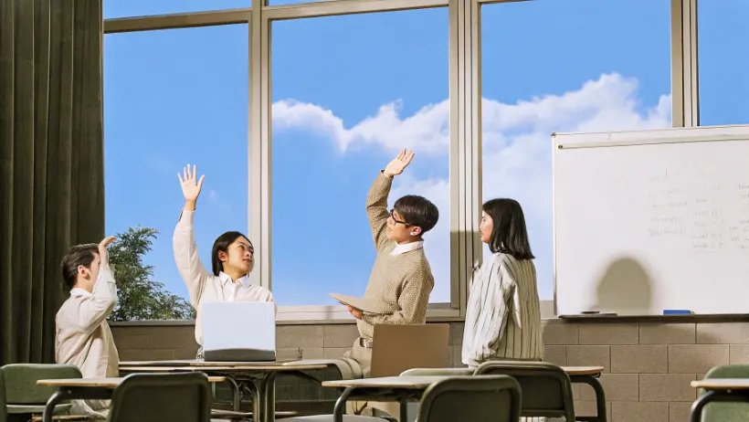 Students engaged in classroom discussion about decision making